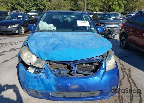 2013 Suzuki Sx4 Le/Le Popular z USA, uszkodzony, nr VIN JS2YC5A37D6100542